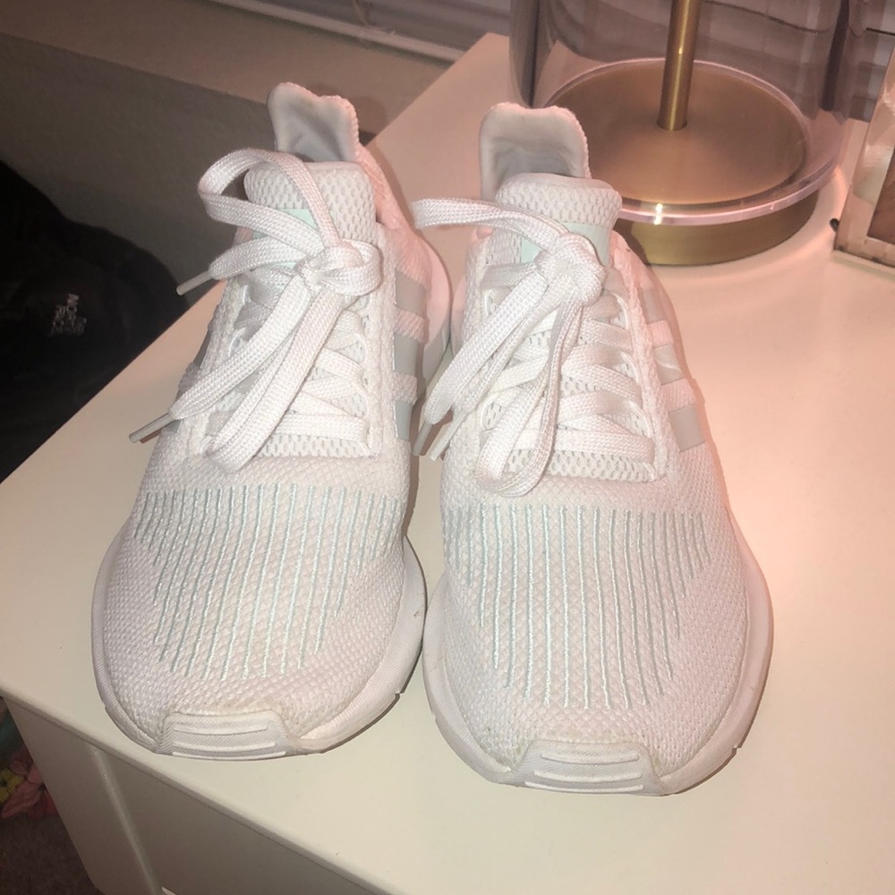 White and light blue adidas sneakers